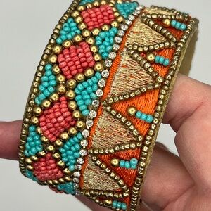 Beaded cuff bracelet. Brilliant colors.